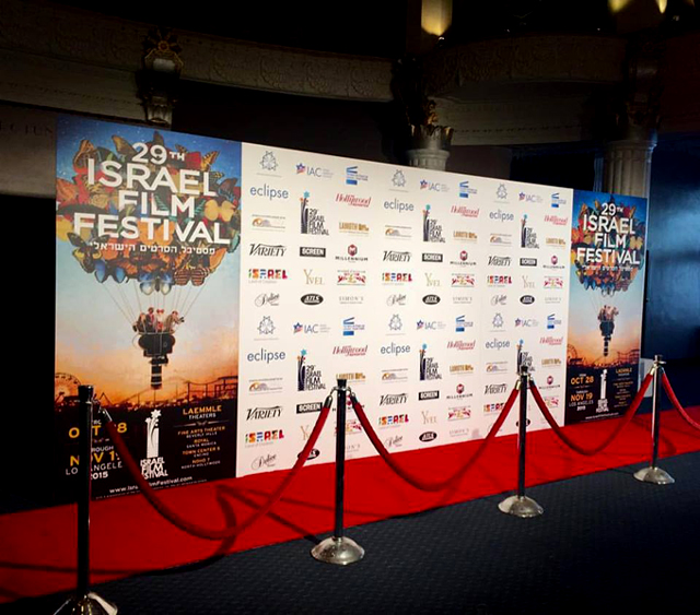 Step and repeat banner, red carpet, red velvet rope and aluminium stanchions for film festival in Los Angeles