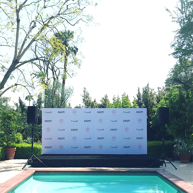 Step and repeat backdrop with swimming pool