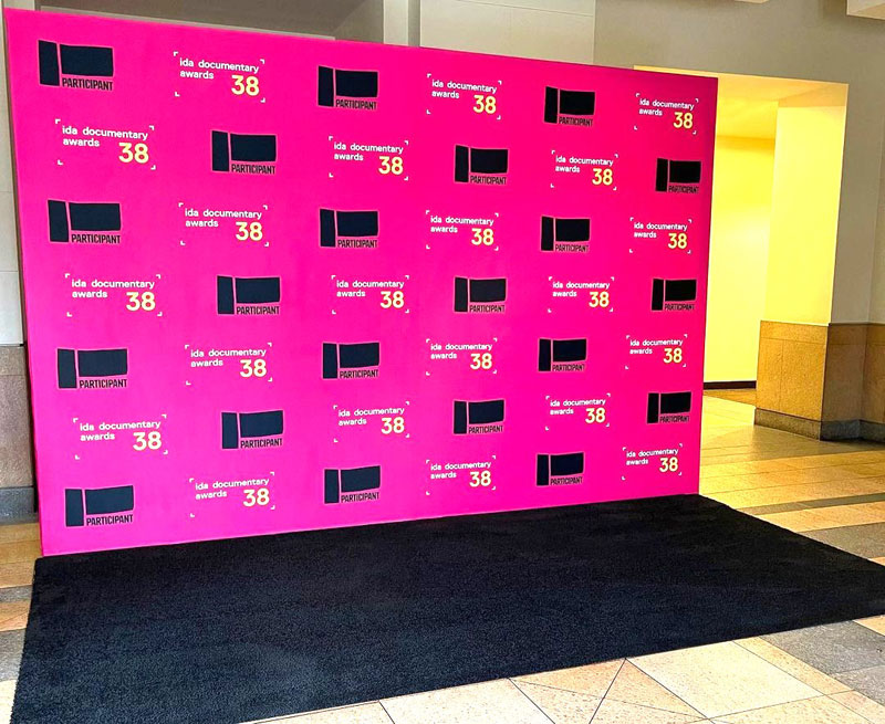 Small Step and Repeat backdrop with black carpet for IDA Documentary Awards.