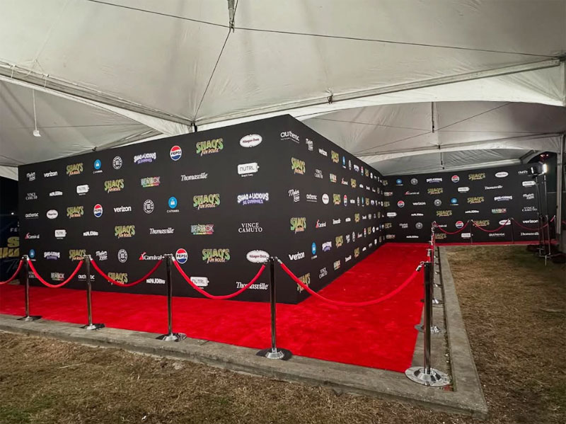 Custom-Shaped Red Carpet Step And Repeat Arrival