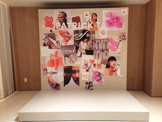 Custom Branded White Riser with Collage Backdrop and 3D logo