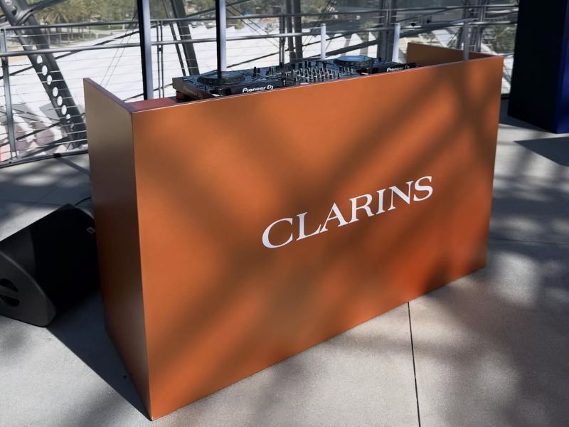 branded DJ orange booth by Red Carpet Systems