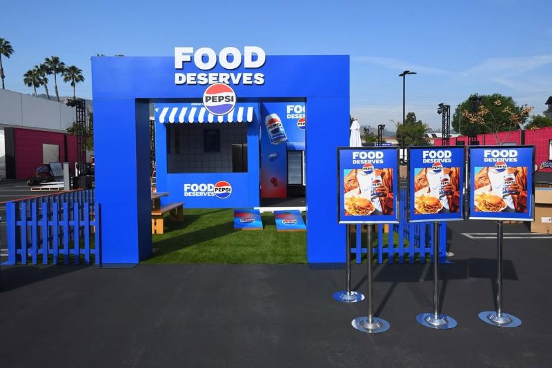 Pepsi Food Deserves arch, fence and sign holders